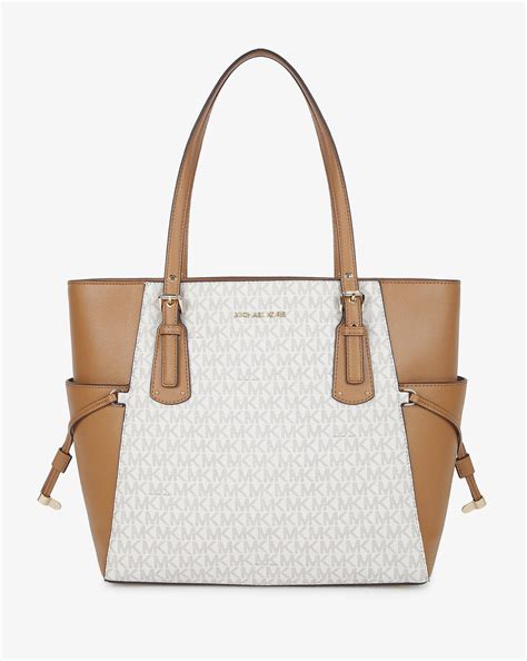 michael kors logo print large vanilla tote|Voyager Large Logo Tote Bag .